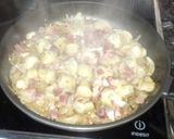 Foto del paso 2 de la receta: Alcachofas con cebolla y jamón serrano
