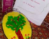 A picture of step 11 of Mango custard cake with green mango tree.