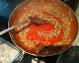 Foto del paso 5 de la receta: Pimientos rellenos de carne y arroz con queso rallado