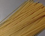 A picture of step 1 of Spaghetti aglio olio e peperoncino with dried tomatoes.