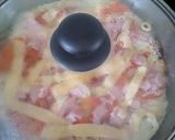 Foto del paso 4 de la receta: Deliciosa pizza con base de huevos y pan