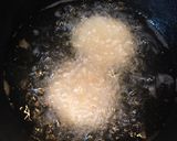 A picture of step 6 of Rasila Kakara Pitha.