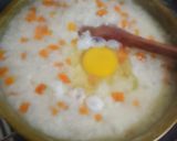 Foto langkah ke 3 dari resep Bubur ayam wortel rosella.
