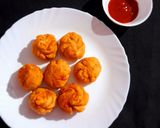 A picture of step 12 of Fried Schezwan Chicken Momos.
