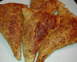 Foto del paso 2 de la receta: Triángulos de hojaldre relleno de nocilla con crocanti de azúcar moreno y almendras molida 