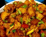 A picture of step 7 of Aloo Gobi Matar (Potato, Cauliflower, and Pea Curry).