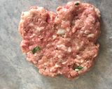 A picture of step 2 of Greek style home burgers.