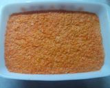 A picture of step 7 of Easy Gajar Halwa with icing glaze.