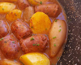 Foto del paso 8 de la receta: Cazuela mar y montaña de butifarra, calamar y patatas