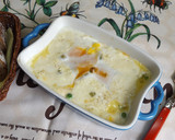 Foto del paso 2 de la receta: Cazuelas horneadas de huevos con guisantes