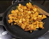 A picture of step 3 of Tawa Fried masala Idly.