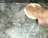A picture of step 13 of Lahori halwa porri with aalo aur chana bhaaji.