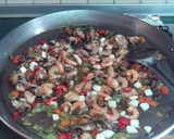Foto del paso 11 de la receta: Paella mixta de marisco y pollo