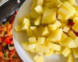 A picture of step 3 of Aloo chana masala.
