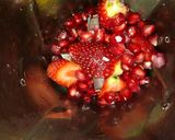 A picture of step 2 of Pinacolada and strawberries mocktail.