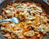 A picture of step 5 of Chicken Strips Parmigiana Style.