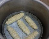 A picture of step 11 of Bread Rolls.