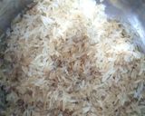 Foto del paso 9 de la receta: Calamares de potera en salsa de verduras y tinta con arroz blanco y escamas de naranja