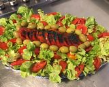 Une image de l'étape 6 de Salade feuille de chêne aux tomates cœur de bœuf,olives vertes et spiruline.