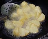 A picture of step 2 of Aloo Dum Biryani.