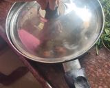 A picture of step 5 of Smokey tandoori chicken drumsticks biryani with mint mango raita.