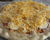 Foto del paso 4 de la receta: Hojaldre de cebolla, panceta y huevo duro