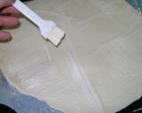 Foto del paso 1 de la receta: Palmeritas caseras con jamón y queso