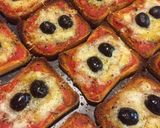 Foto del passaggio 5 della ricetta Pizzette di fette biscottate