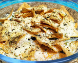 Foto del paso 4 de la receta: Nachos horneados con queso y orégano