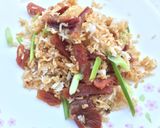 A picture of step 7 of Preserved Duck Meat And Chinese Sausage Fried Rice.
