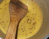 A picture of step 9 of Curried Sweet Potatoes in Coconut Milk.