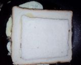 A picture of step 4 of Stuffed cheesy chicken toast.