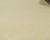 A picture of step 2 of Person Tikka pizza.