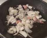 Foto del paso 3 de la receta: Pollo guisado al cardamomo y cilantro