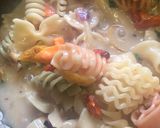 A picture of step 4 of White sauce pasta with multiple pasta.