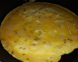 A picture of step 4 of Inda na puda (stuff egg omelette).
