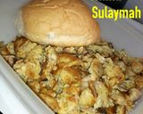 A picture of step 3 of Scramble egg with sardine.
