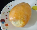 A picture of step 4 of Ice cream loaded mango.