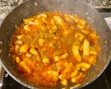 Foto del paso 4 de la receta: “ Arroz meloso” con anillas de pota