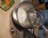 A picture of step 8 of Kiwi swiss roll cake.