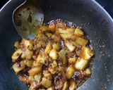 A picture of step 3 of Raw Mango Lonji.