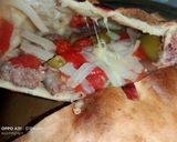 A picture of step 8 of Sausage Hawawshi.