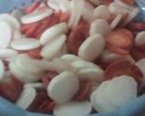 A picture of step 1 of Gajer Mouli or Hari Mirch ka Achar.