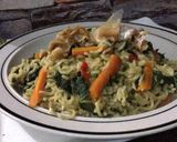A picture of step 4 of Noodles veggies with Stockfish flakes.