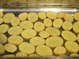 Mil hojas de papas, crema y jamón crudo