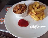 A picture of step 3 of White onion sauce with potato wedges and sauce.