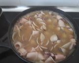 Foto del paso 6 de la receta: Dorada al horno con almejas, gambón, patatas y chipirones