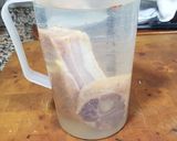 A picture of step 1 of Fabada with Chorizo, Blood Sausage, and Pork Ear in a Pressure Cooker.