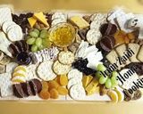 A picture of step 1 of 🧀🥓🍇🍪🍊🌰🍹Charcuterie Board(cheese board)🧀🥓🍇🍪🍊🌰🍹.