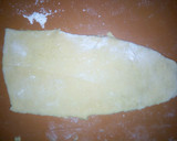 A picture of step 8 of Strawberry and peanut butter rolls.